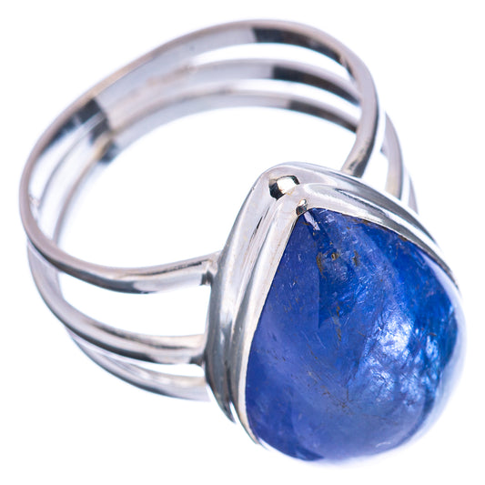 Sterling silver ring with oval bright blue faceted gemstone and open shank