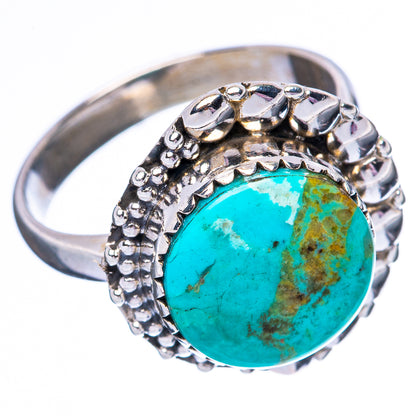 Turquoise cabochon sterling silver ring with oval stone, raised beaded edges, wide band