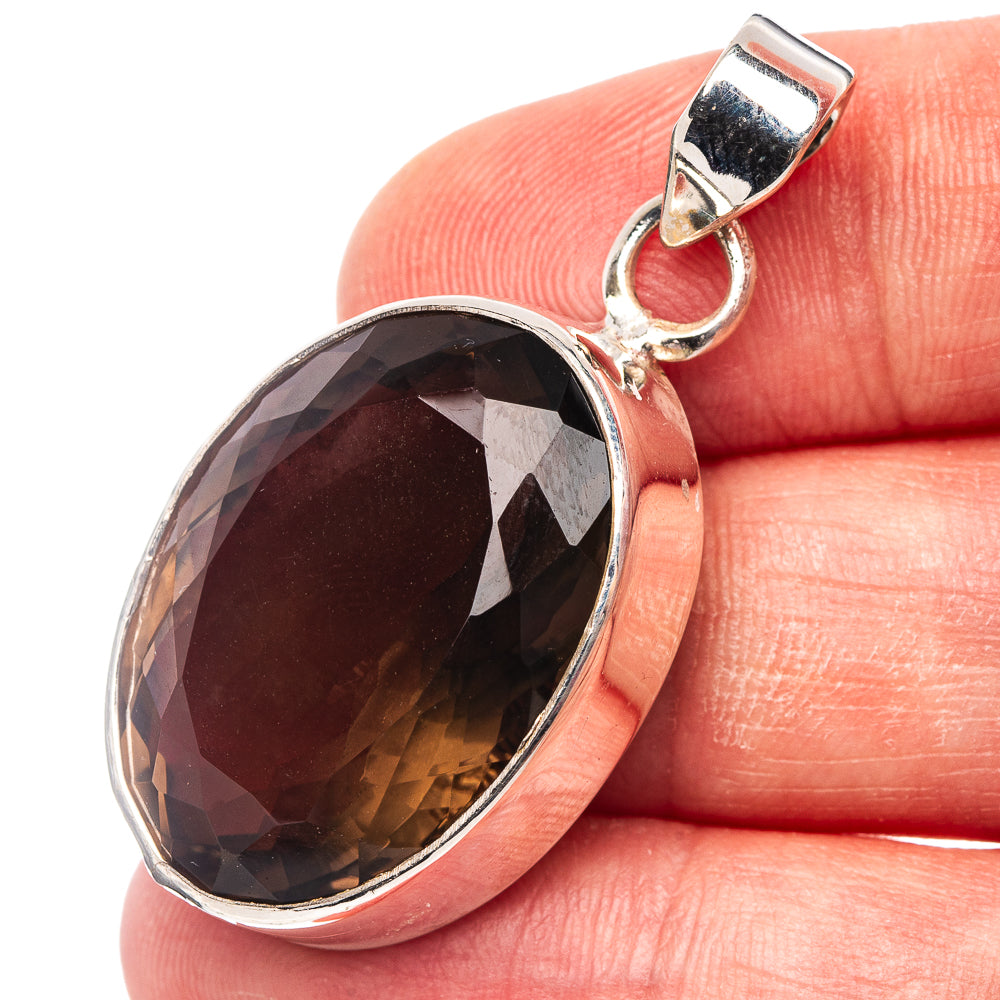 Oval smoky quartz pendant, .925 sterling silver bezel, loop bail, faceted dark stone