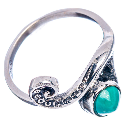 Sterling silver turquoise oval gemstone ring with curved wave motif and bezel setting