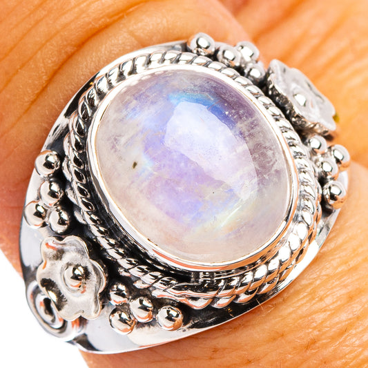 Sterling silver moonstone ring with oval iridescent gemstone and ornate beaded band