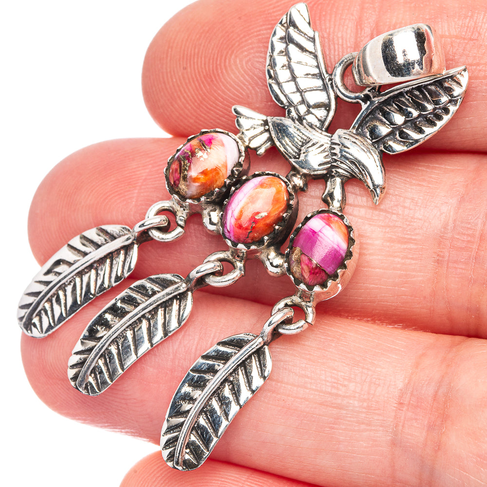 Eagle pendant in 925 sterling silver with pink and orange gemstone-like beads