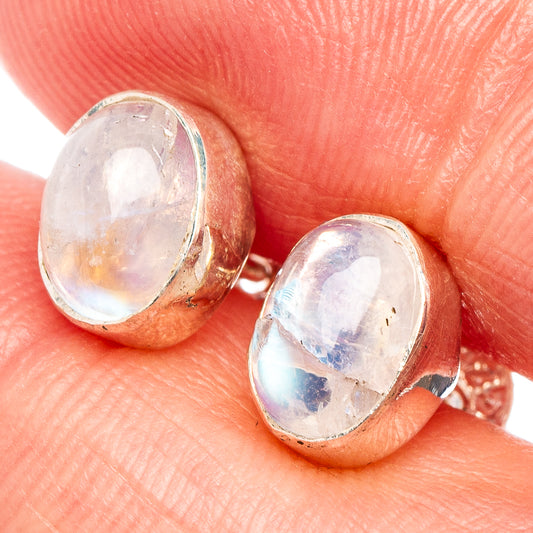 Rainbow moonstone oval stud earrings in .925 sterling silver, close-up view