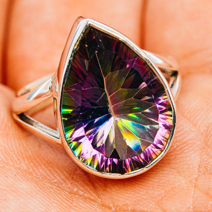 Sterling silver teardrop gemstone ring in side view, faceted rainbow mystic topaz
