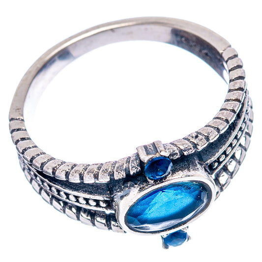 Sterling silver blue quartz ring with oval center stone and etched band with blue accents