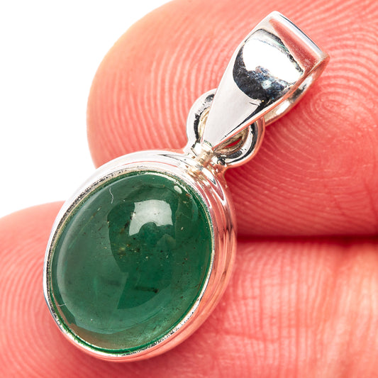 Oval green emerald cabochon pendant in .925 sterling silver bezel with bail