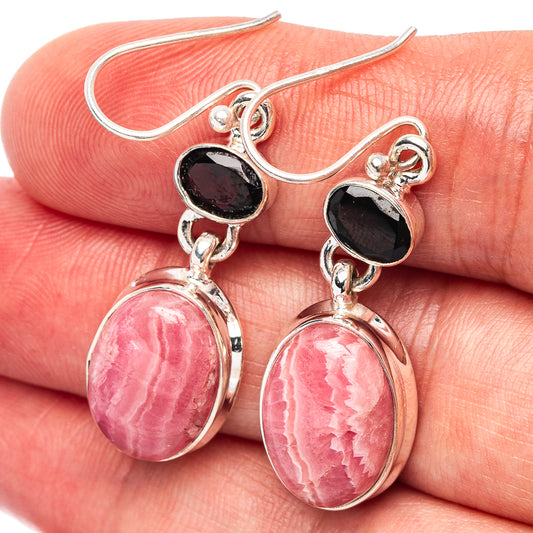 Sterling silver drop earrings with pink rhodochrosite ovals and dark garnet cabochons