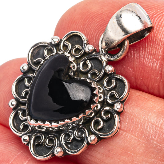 Heart onyx pendant in .925 sterling silver, ornate filigree frame and bail