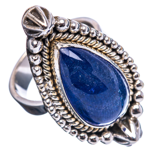 Sterling silver adjustable ring with large blue oval gemstone and raised halo details