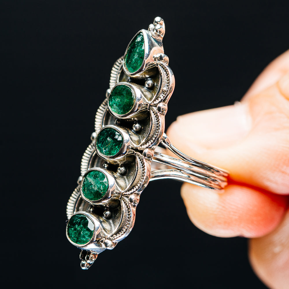 Sterling silver ring with five oval green stones and open gallery side view
