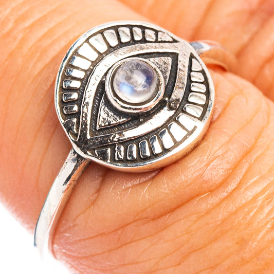 Sterling silver eye ring with oval moonstone and carved geometric border