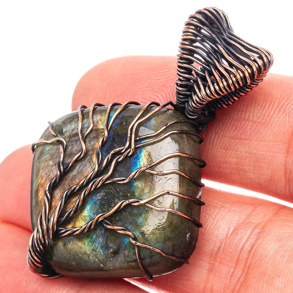 Wire-wrapped labradorite pendant, oxidized copper heart frame with blue flash