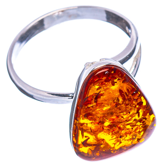 Silver adjustable ring with faceted amber teardrop stone, warm golden-orange