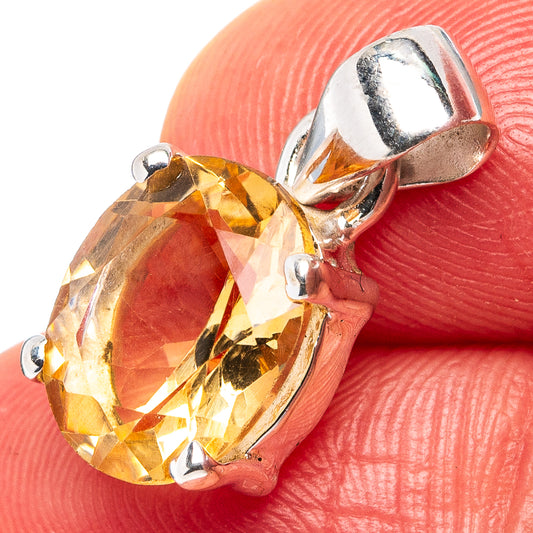 Faceted citrine pendant with oval yellow gemstone in .925 sterling silver prongs
