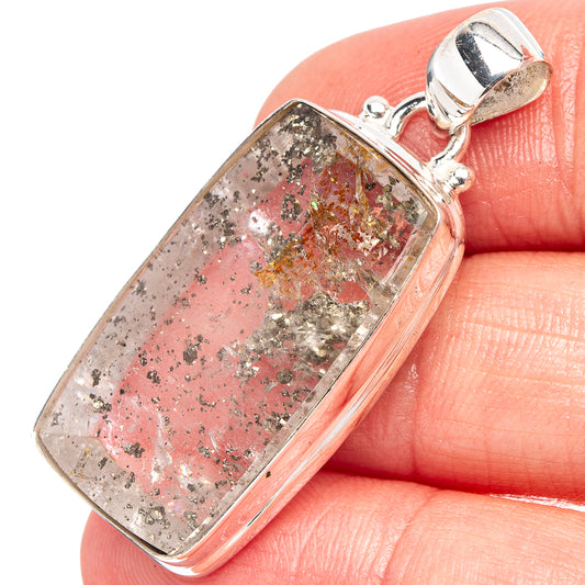 Marcasite in quartz pendant, rectangular silver frame with sparkly black flecks on quartz
