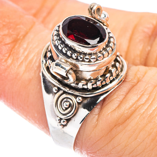 Garnet poison ring, .925 sterling silver, dark red oval stone, size 6.25