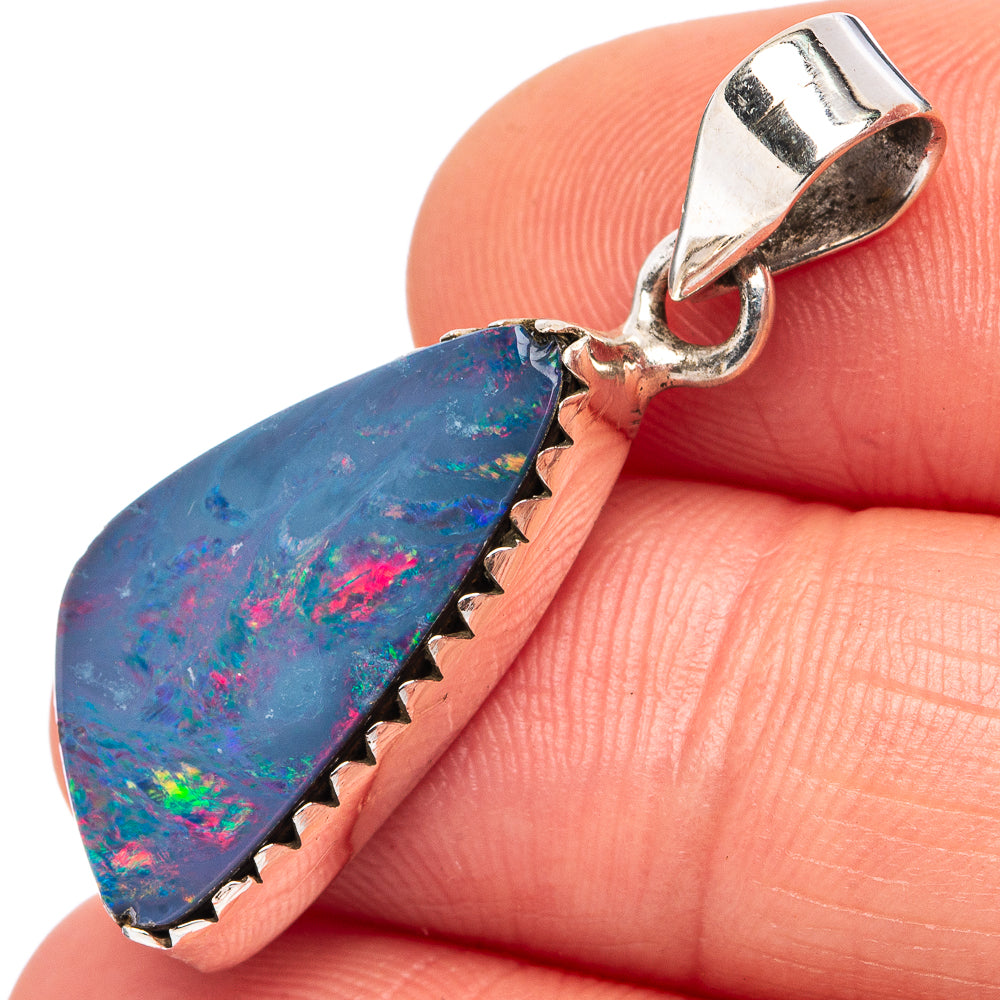 Sterling silver opal doublet pendant with faceted teardrop stone