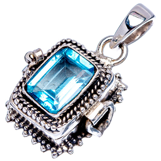 Sterling silver pendant with square blue gemstone, ornate bezel and bail