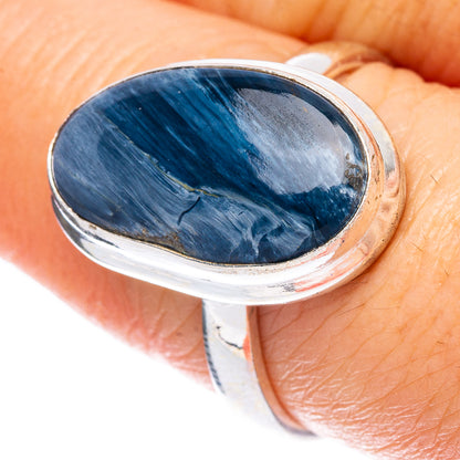 Sterling silver ring with oval blue pietersite cabochon, smooth bezel and polished band