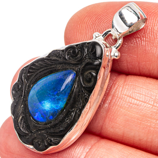 Sterling silver opal pendant with dark frame and teardrop blue doublet gemstone