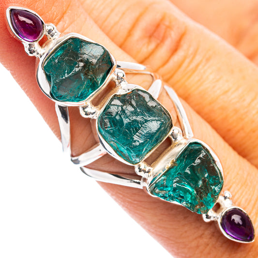 Sterling silver ring with three green oval gemstone settings and purple amethyst accents