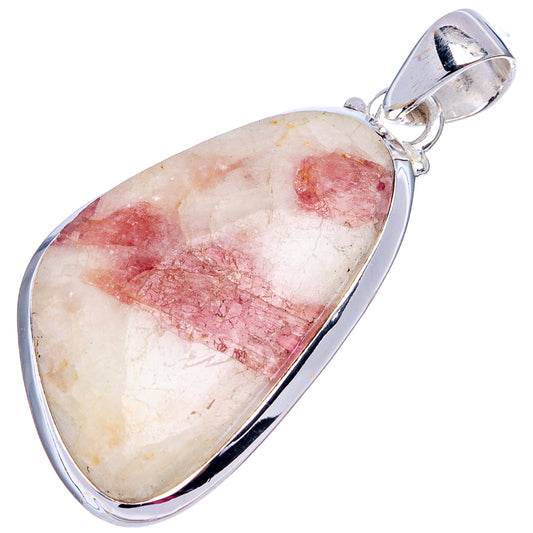 Sterling silver pendant with teardrop pink tourmaline in quartz cabochon.