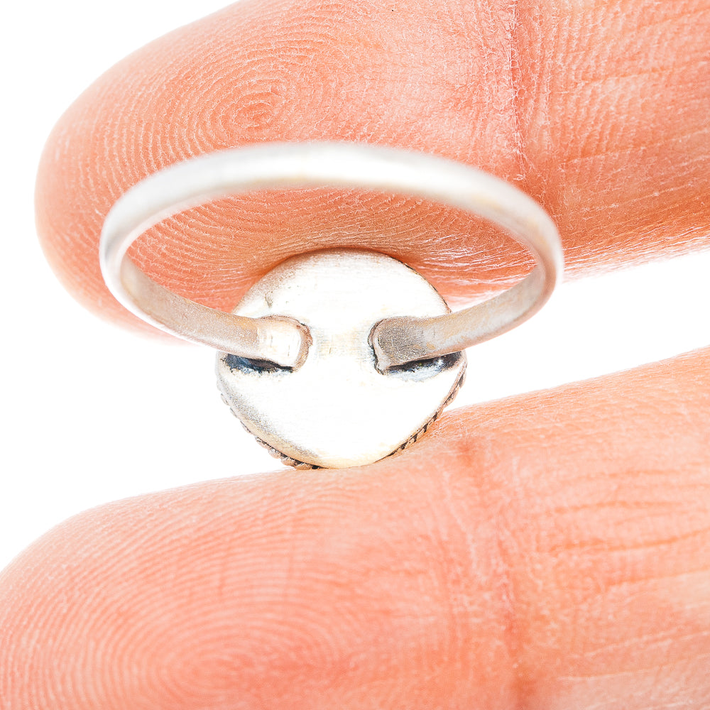 Sterling silver ring underside with prong-like support under turquoise setting
