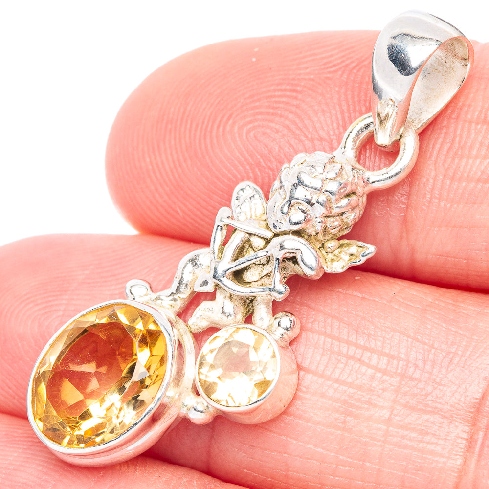 Angel pendant in 925 sterling silver with faceted citrine and small round citrine accents