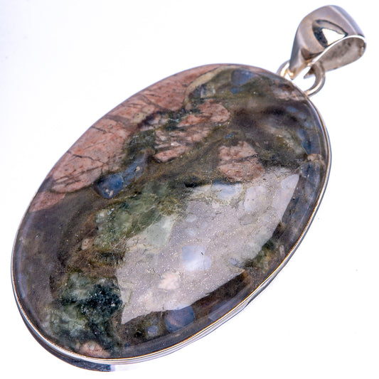 Mottled oval jasper pendant with .925 sterling silver setting and top bail