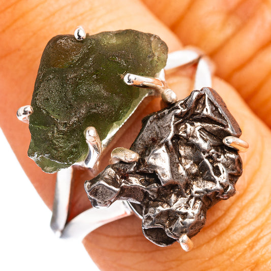 Sterling silver ring with rough green gemstone set in dark meteorite-style metal
