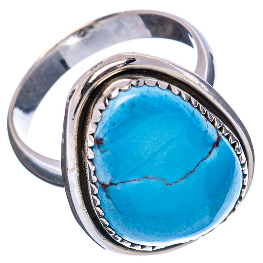 Turquoise cabochon adjustable sterling silver ring with bezel and rope border