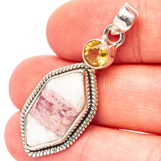 Sterling silver teardrop pendant with pink tourmaline-in-quartz stone and round yellow gem top