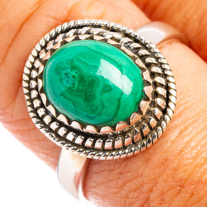 Malachite cabochon ring, size 8.75, oval green stone in ornate sterling silver setting
