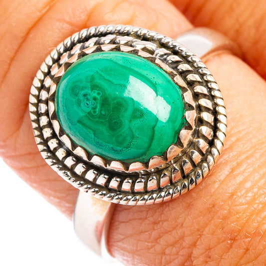 Malachite cabochon ring, size 8.75, oval green stone in ornate sterling silver setting