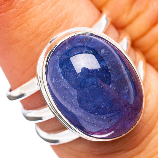 Sterling silver ring with oval blue tanzanite cabochon gemstone, polished bezel setting