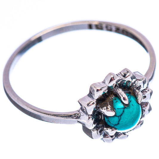 Sterling silver turquoise ring with ornate halo and prong-set accents