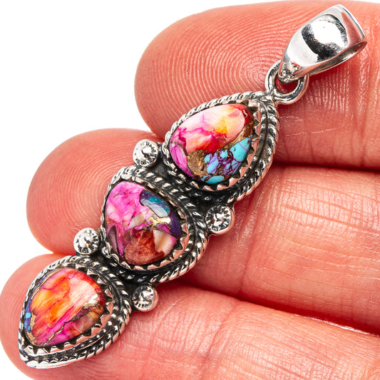 Sterling silver pendant with three multicolor teardrop cabochons and ornate bail