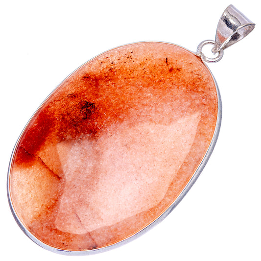 Oval sunstone pendant with orange-pink stone and silver-plated bail loop