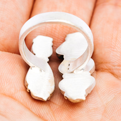 Adjustable .925 sterling silver ring band with two openwork ear-shaped cutouts
