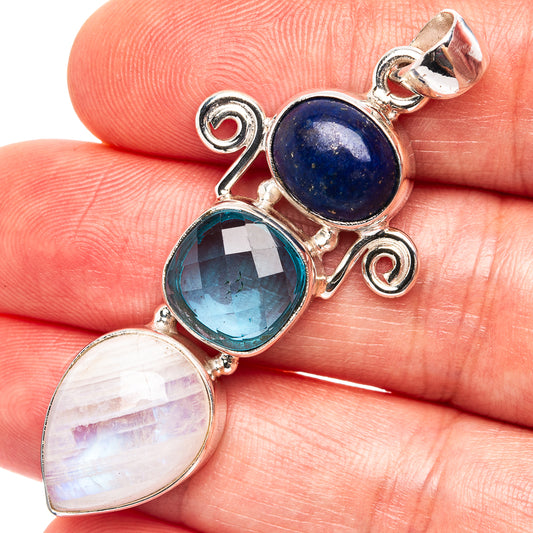 925 sterling silver pendant with three round gemstone cabochons: lapis, blue topaz, moonstone