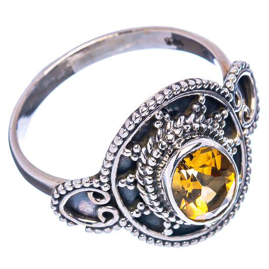 Citrine sterling silver ring, side view of ornate band with oval yellow gemstone