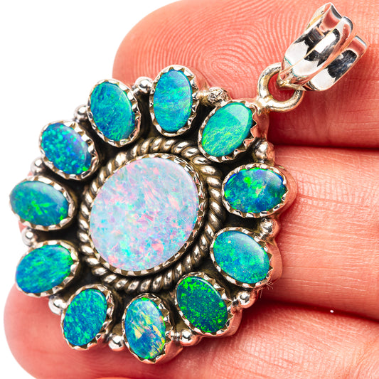 Opal doublet pendant in .925 sterling silver with oval blue-green stone cluster and bail