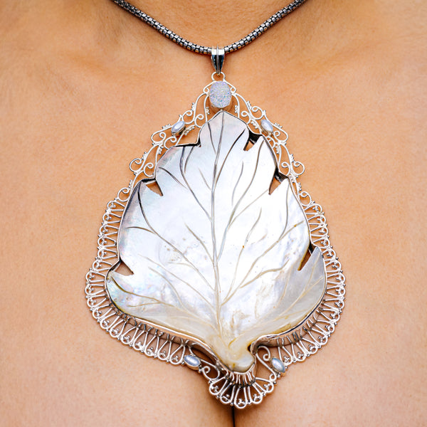 Mother-of-pearl druzy teardrop pendant with sterling silver filigree bail