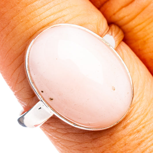 Oval pink opal cabochon ring in .925 sterling silver, bezel setting