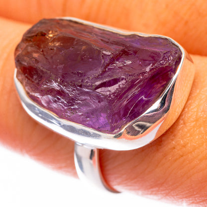 Raw amethyst sterling silver ring with dark purple raw stone, wide silver band.