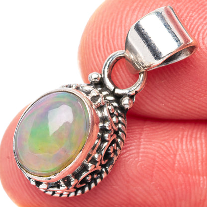 Oval Ethiopian opal pendant with rainbow iridescence, ornate 925 sterling silver setting