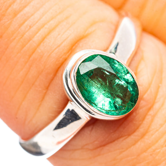 Oval green emerald bezel on .925 sterling silver ring band