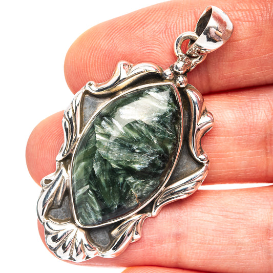 Teardrop green seraphinite pendant with ornate .925 sterling silver frame and bail