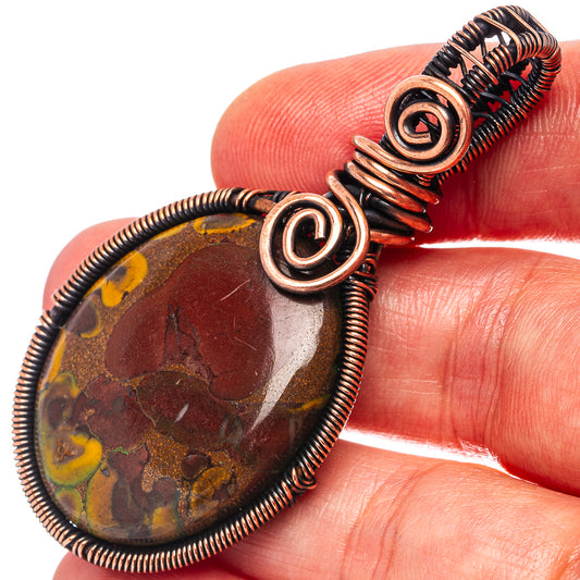 Oxidized copper wire wrap jasper pendant with teardrop stone and spiral loop detail
