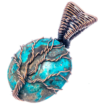 Turquoise stone pendant with oxidized copper wire frame and tree design